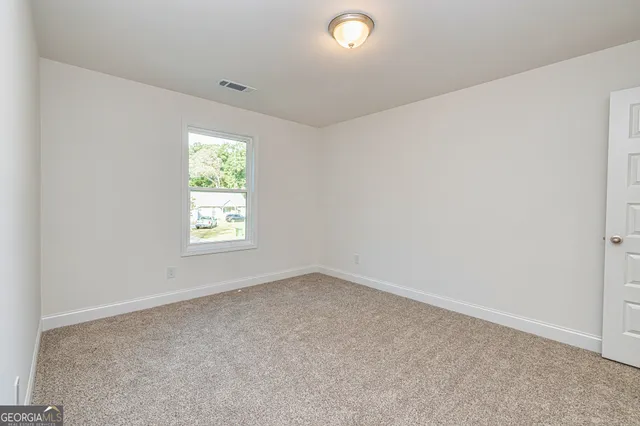 an empty room with an entryway
