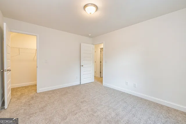 a view of a room with racks on the wall