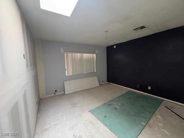 1275 Westwind Road Las Vegas, NV 89146 - Photo 8 of 30 Unfurnished room featuring a skylight and visible vents