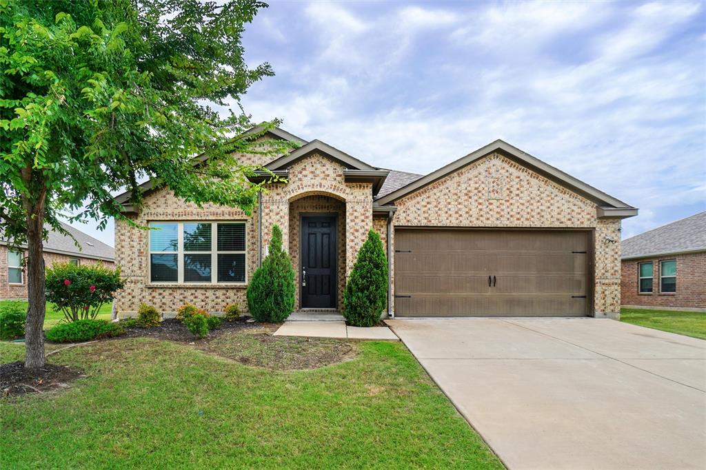 3012 Megan Street Denton, TX 76209 - Photo 1 of 1 front view of a house with a yard