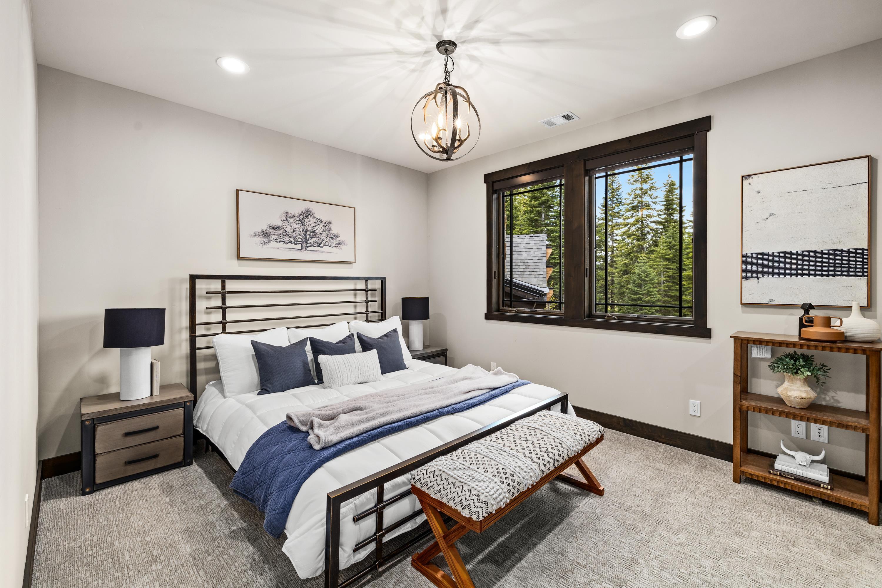 9355 Nine Bark Road Truckee, CA 96161 - Photo 11 of 21 a bedroom with a bed and a window