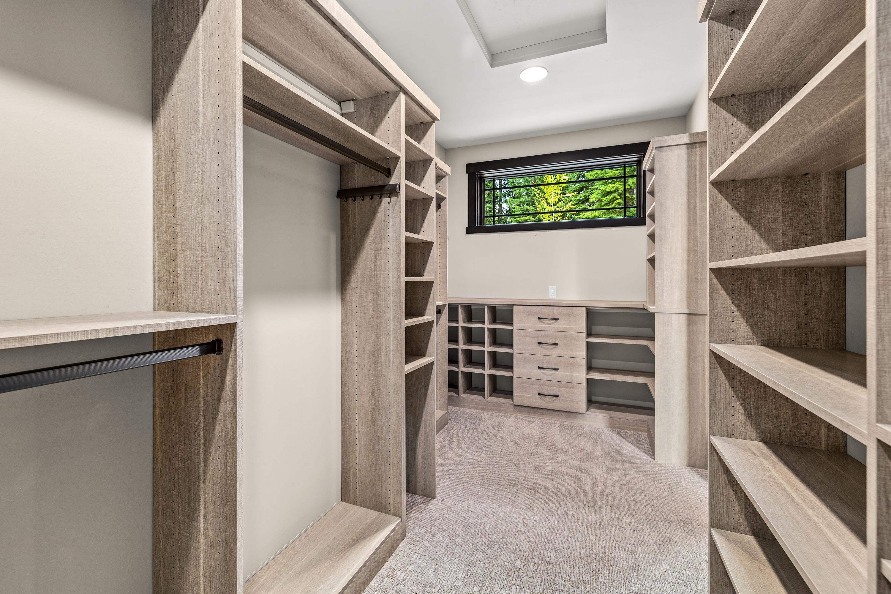 9355 Nine Bark Road Truckee, CA 96161 - Photo 18 of 21 a view of walk in closet with wooden floor