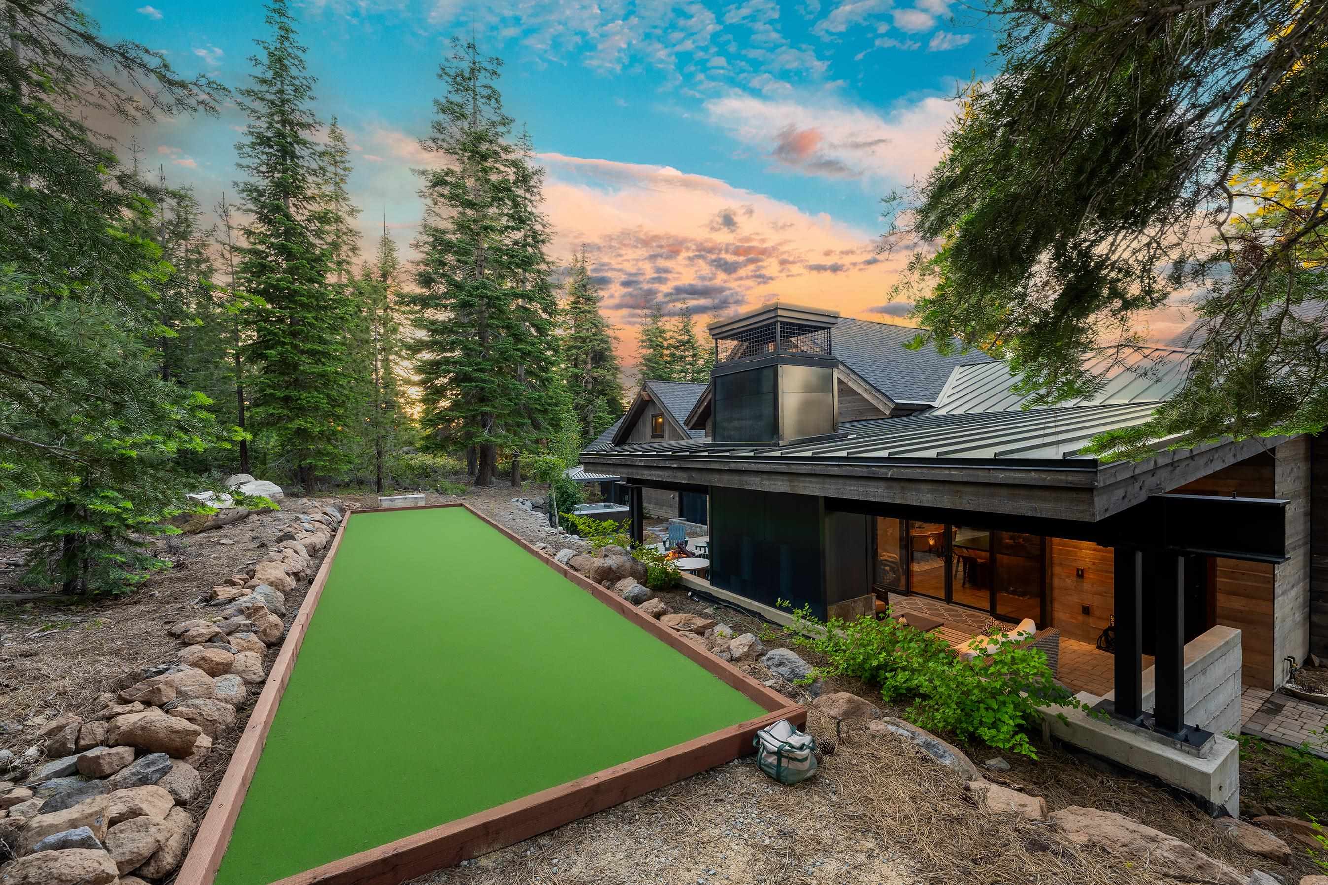 9355 Nine Bark Road Truckee, CA 96161 - Photo 3 of 21 a view of a house with a backyard