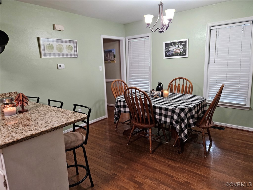 7106 Full Rack Drive Midlothian, VA 23112 - Photo 13 of 26 a view of a dining room furniture and wooden floor