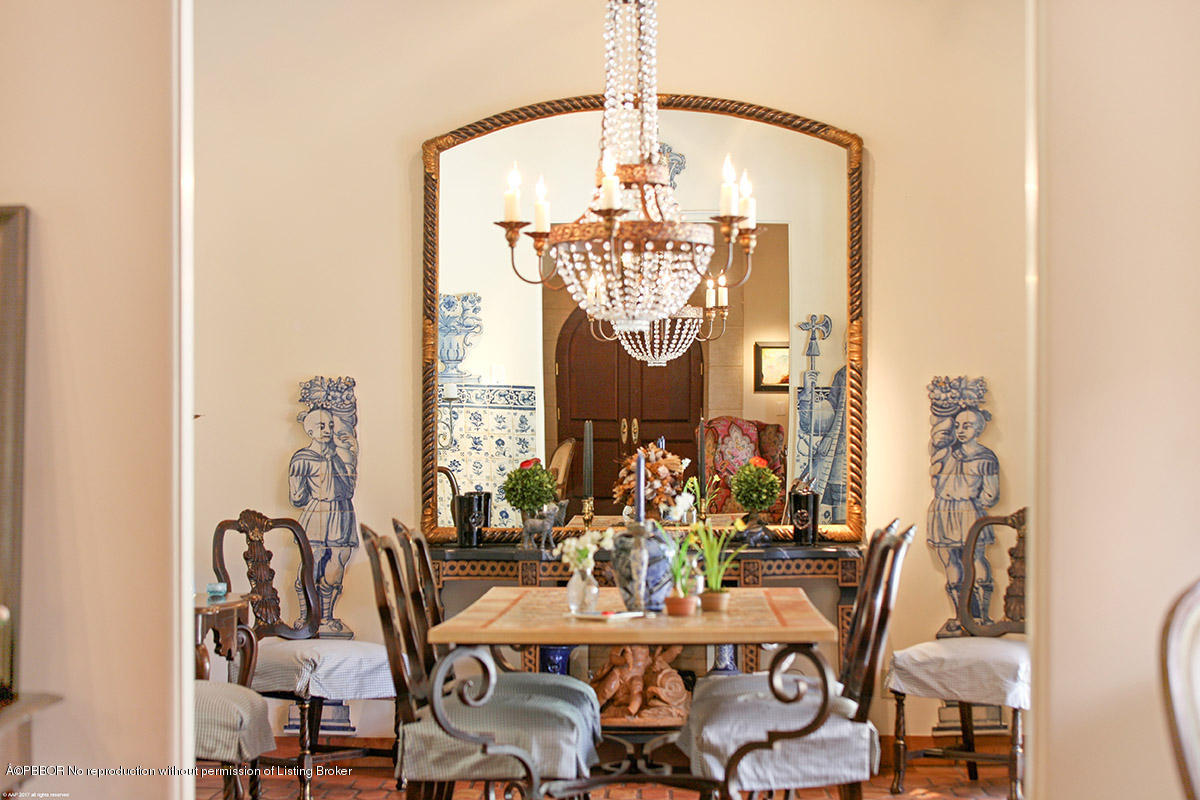 1 Golfview Road Palm Beach, FL 33480 - Photo 15 of 38 a view of a dining room with furniture and chandelier