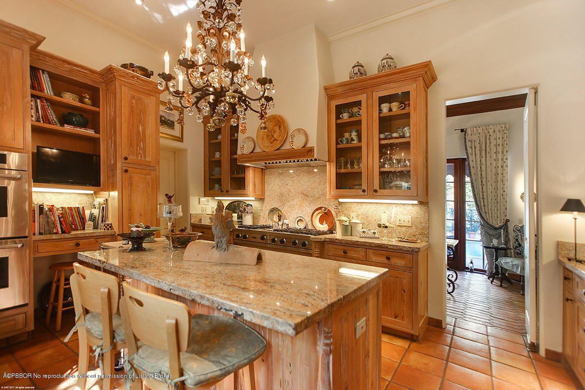 1 Golfview Road Palm Beach, FL 33480 - Photo 20 of 38 a view of a kitchen area with furniture and chandelier