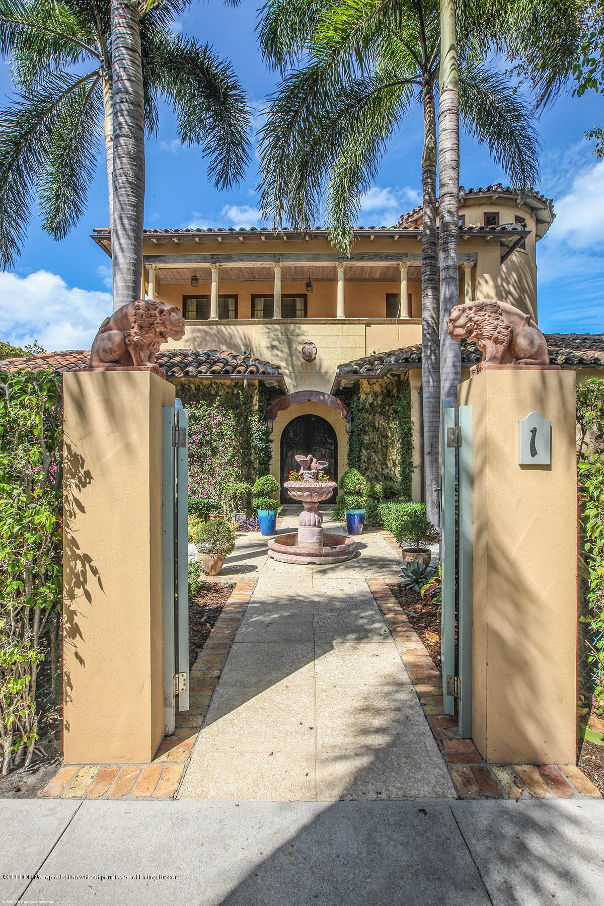 1 Golfview Road Palm Beach, FL 33480 - Photo 3 of 38 a view of a house with a yard and palm trees
