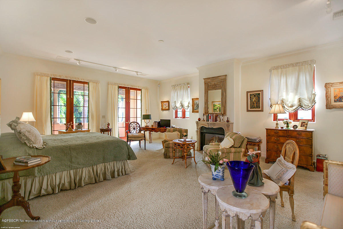 1 Golfview Road Palm Beach, FL 33480 - Photo 23 of 38 a living room with furniture a dining table and a window