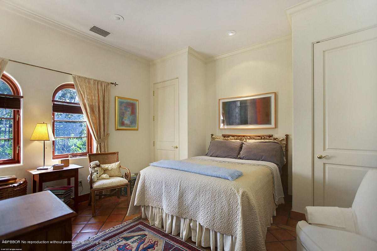 1 Golfview Road Palm Beach, FL 33480 - Photo 26 of 38 a bedroom with a bed and wooden floor
