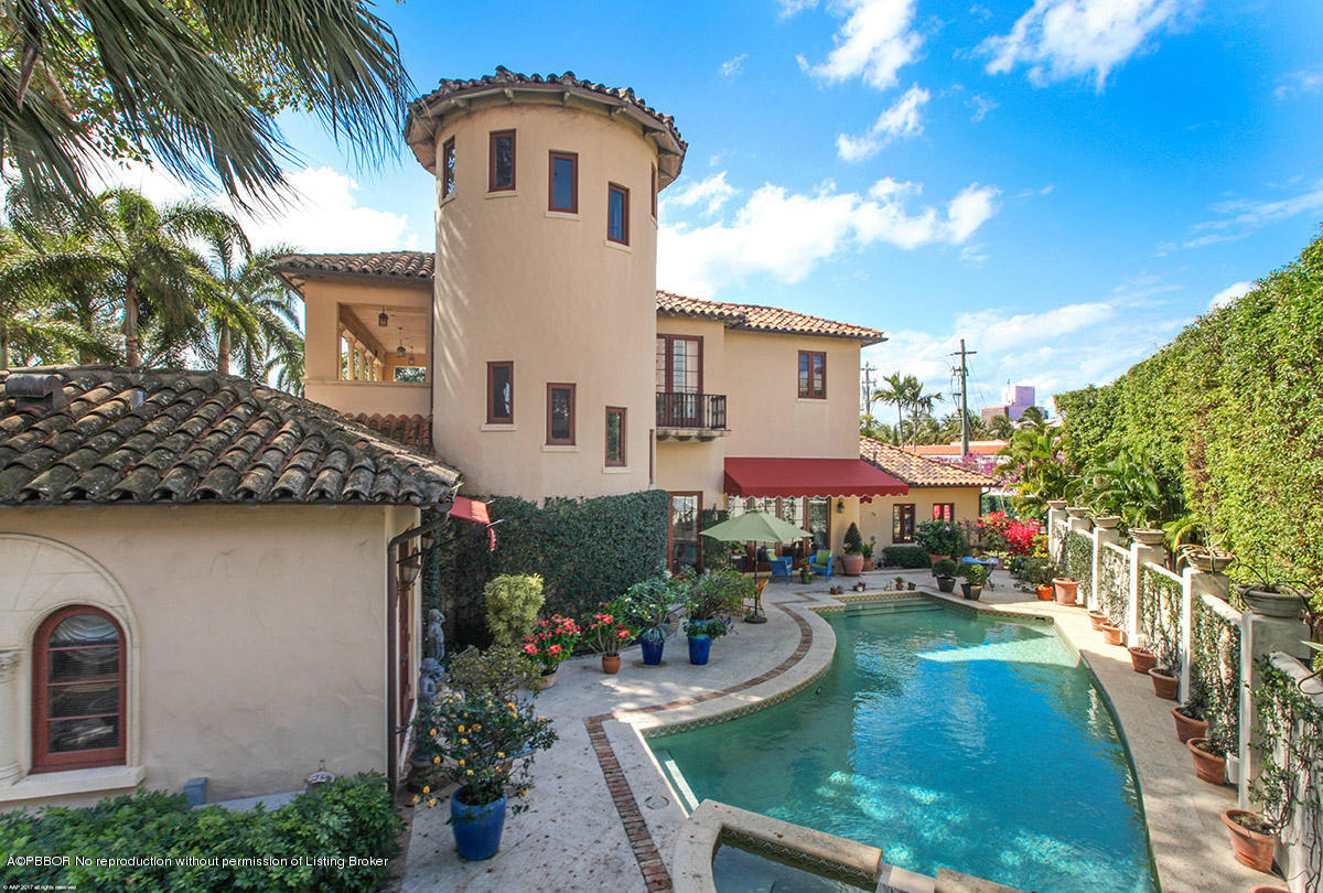 1 Golfview Road Palm Beach, FL 33480 - Photo 30 of 38 a view of a house with a yard