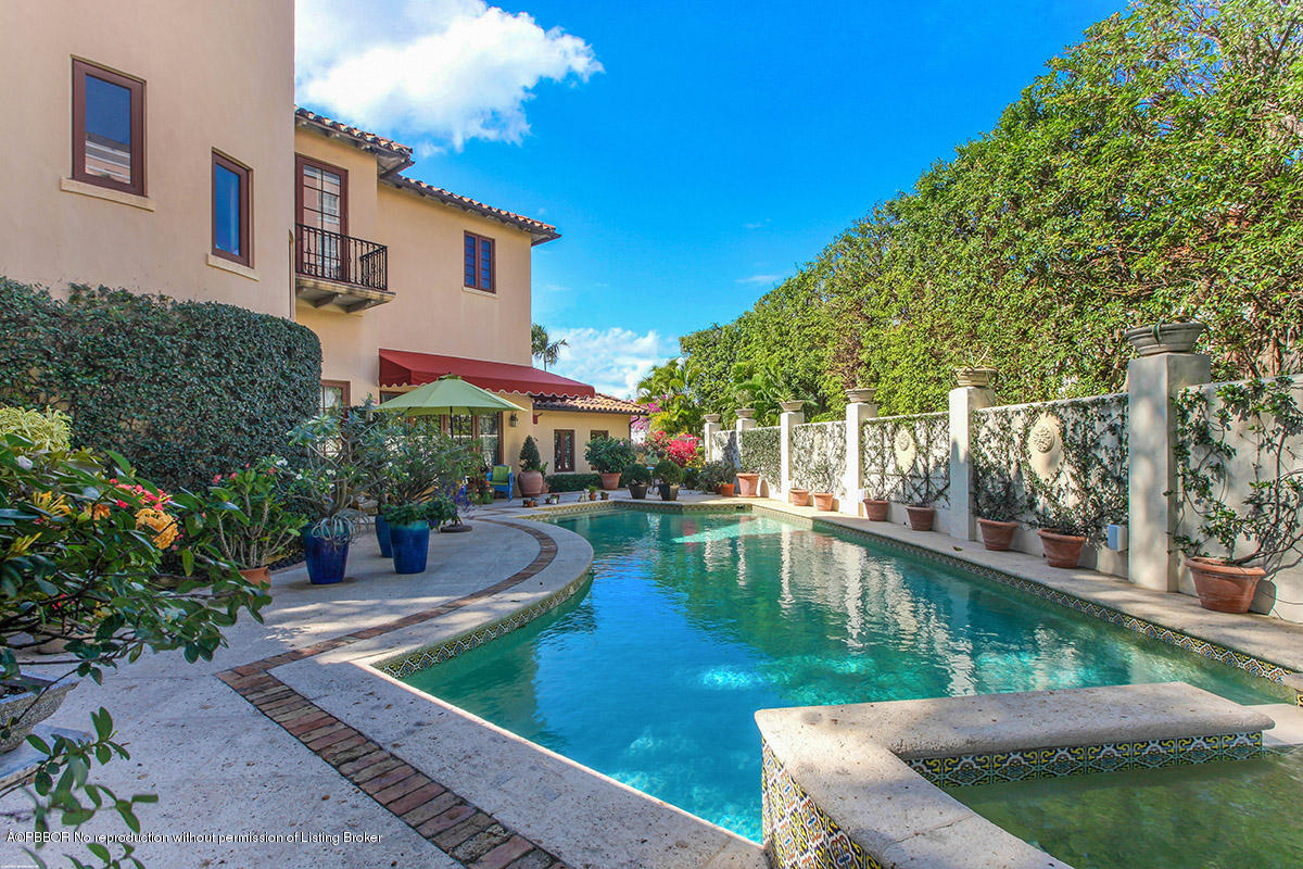 1 Golfview Road Palm Beach, FL 33480 - Photo 31 of 38 a view of a house with swimming pool and sitting area