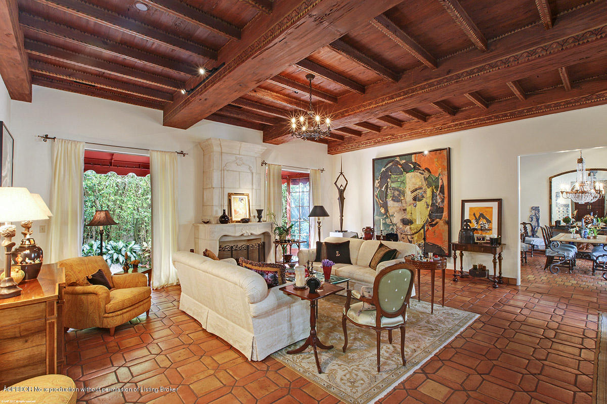1 Golfview Road Palm Beach, FL 33480 - Photo 9 of 38 a living room with furniture and a chandelier