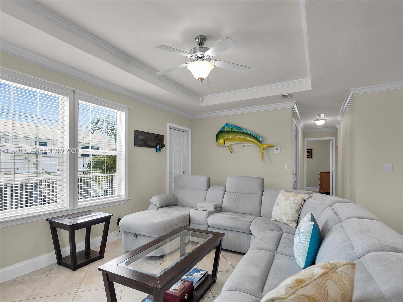437 Pirates Road Summerland Key, FL 33042 - Photo 15 of 39 a living room with furniture and a large window