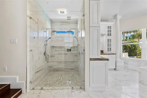 a view of a park with plants and trees