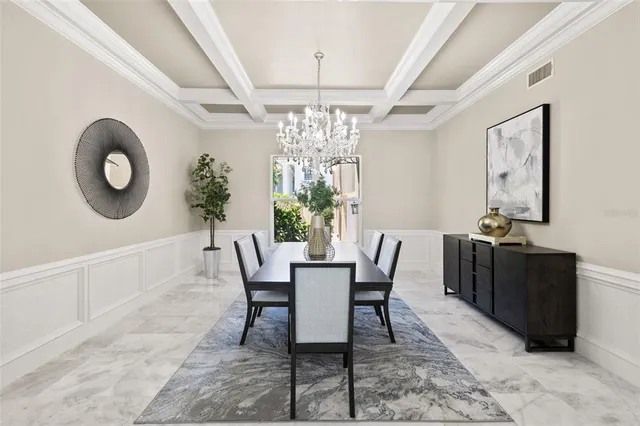 a room with pool table and windows