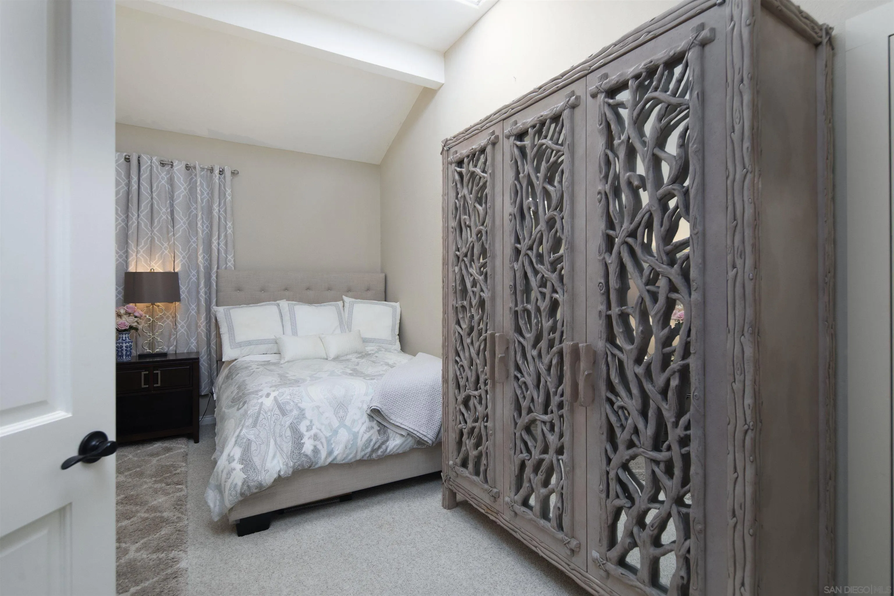 15448 Pimlico Corte Rancho Santa Fe, CA 92067 - Photo 27 of 31 a bedroom with a bed and a curtain