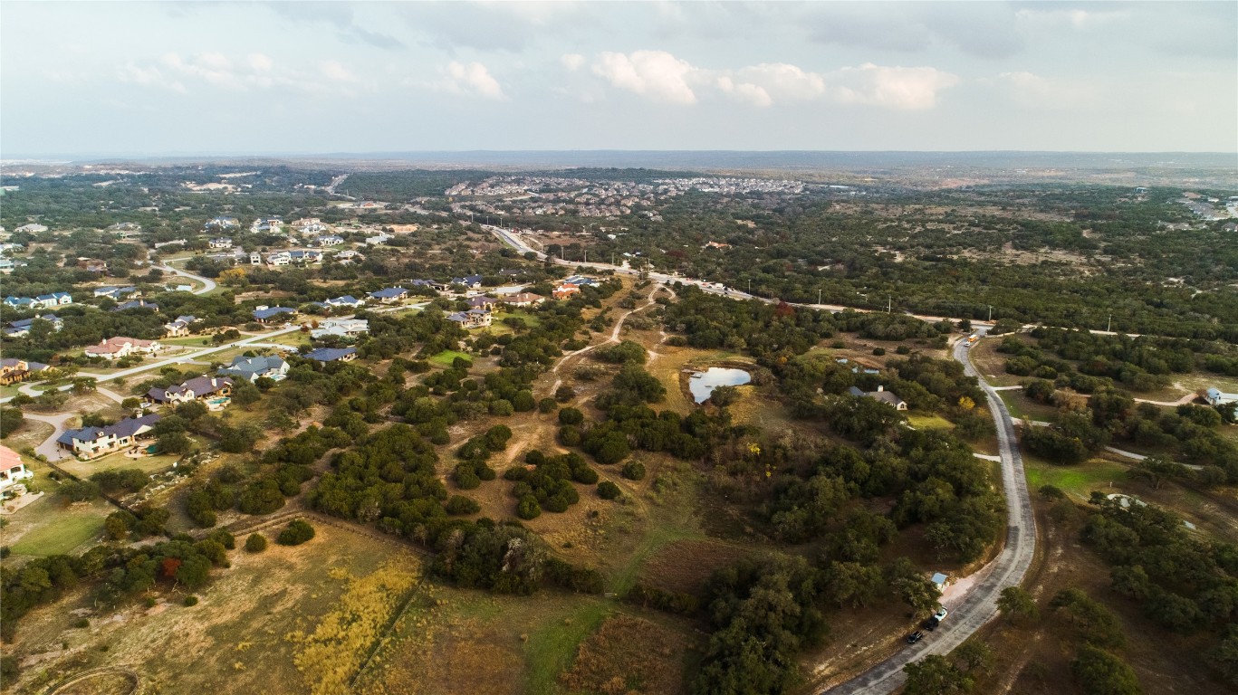 17650 Hamilton Pool Road Austin, TX 78738 - Photo 21 of 26 an aerial view of residential houses with city view