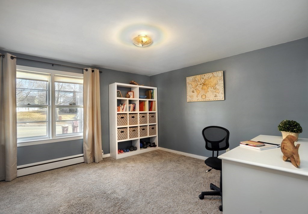 7 Spring Street Weymouth, MA 02188 - Photo 12 of 18 a view of a livingroom with furniture and staircase