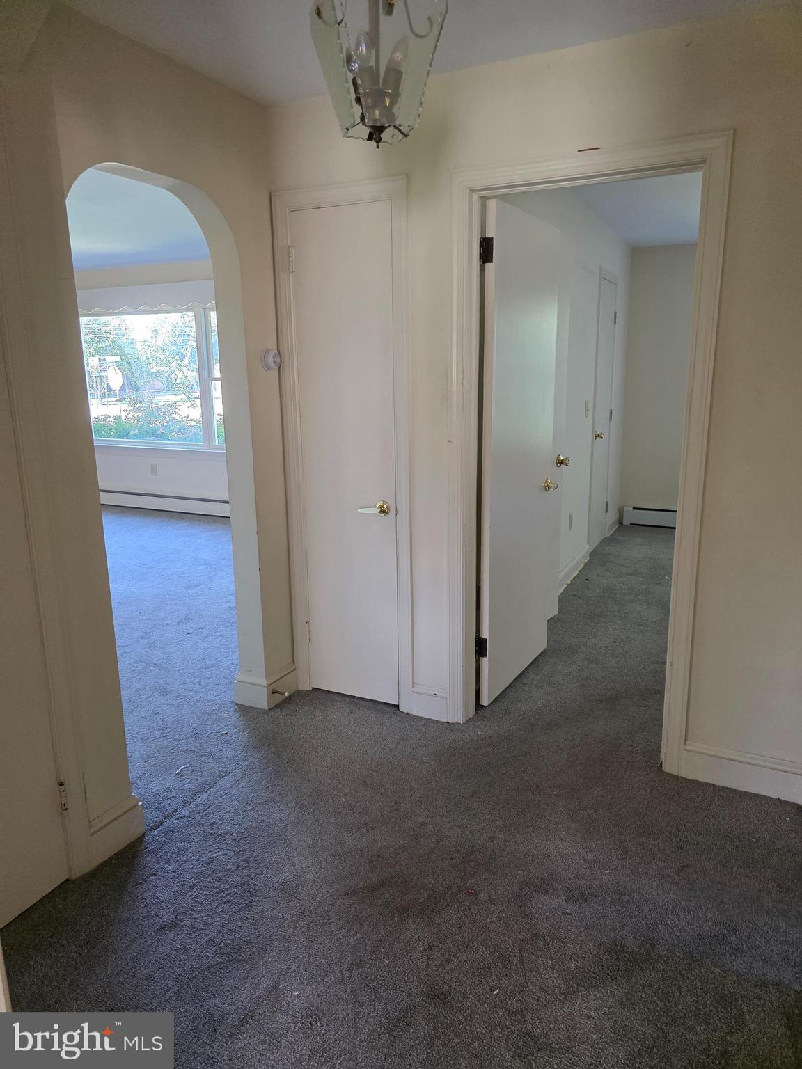706 East Division Street Dover, DE 19901 - Photo 11 of 16 an empty room with windows and closet