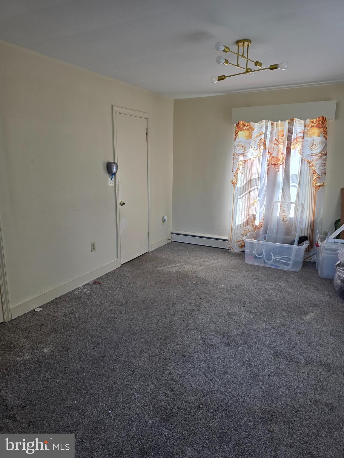 706 East Division Street Dover, DE 19901 - Photo 14 of 16 a view of an empty room with a window