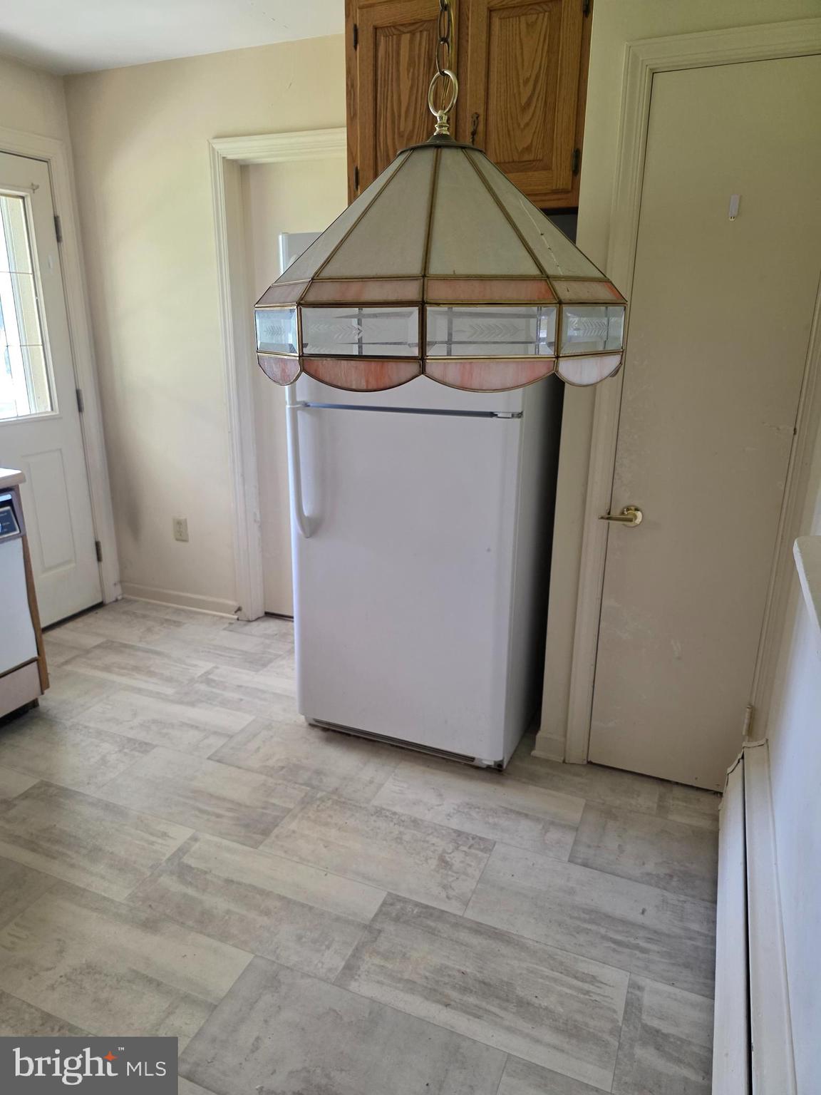 706 East Division Street Dover, DE 19901 - Photo 6 of 16 a view of a utility room with washer and dryer