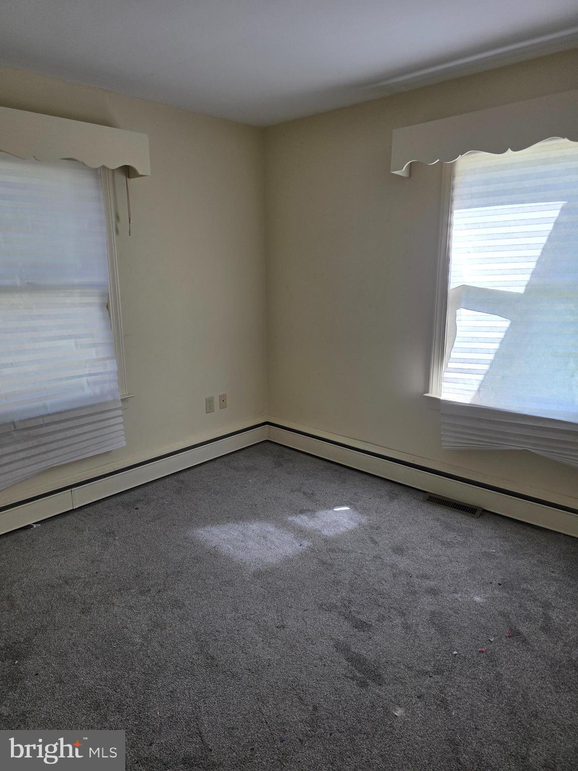 706 East Division Street Dover, DE 19901 - Photo 9 of 16 a view of an empty room and a window