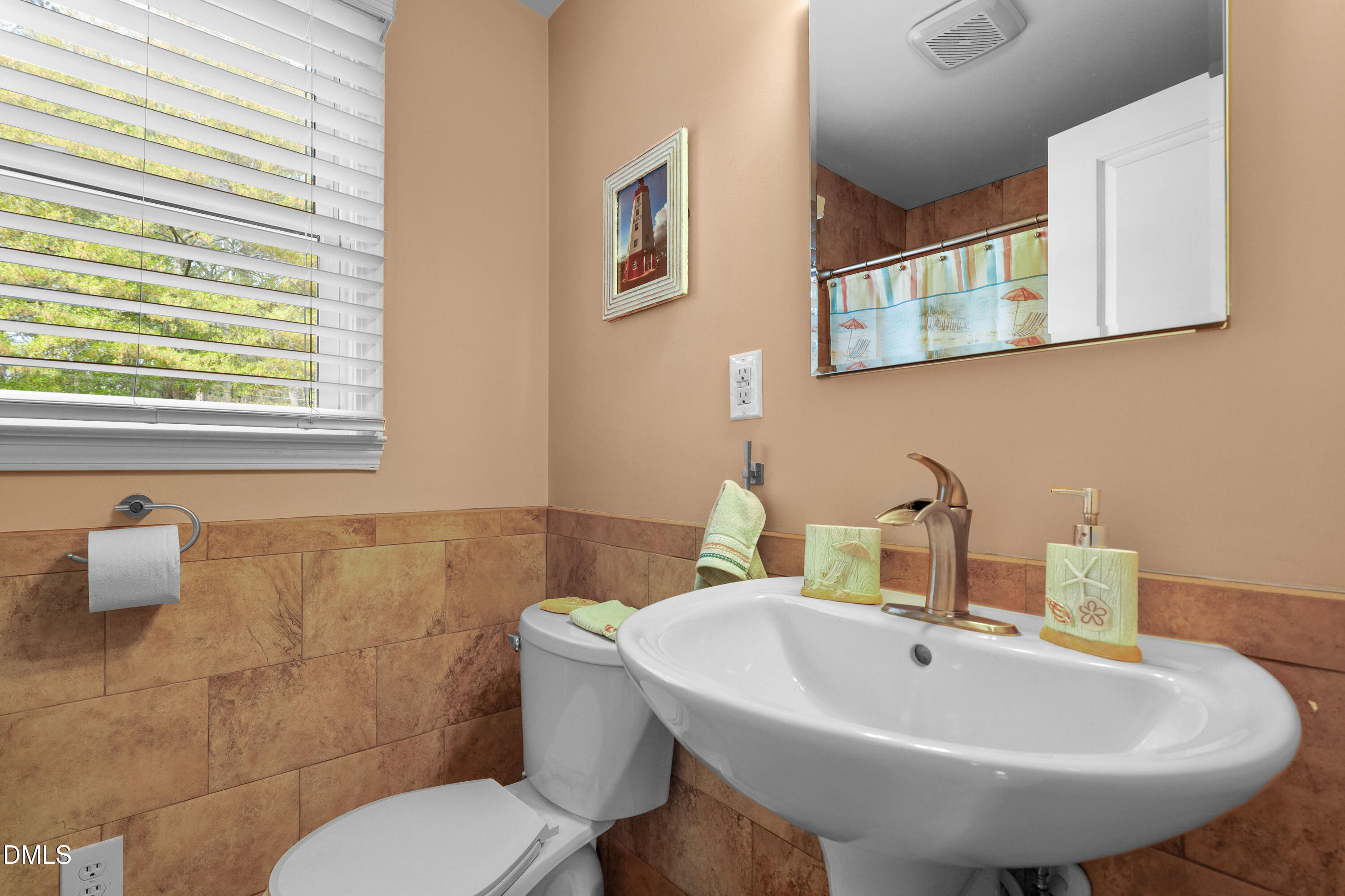 1491 Farrington Point Road Chapel Hill, NC 27517 - Photo 17 of 52 a bathroom with a sink and a toilet