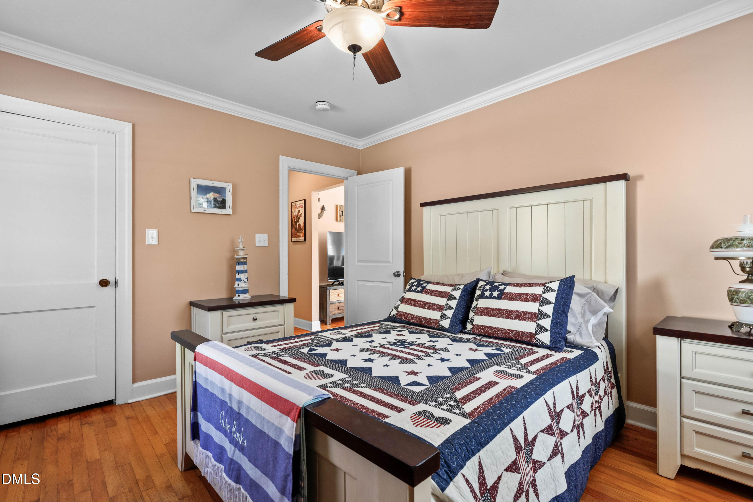 1491 Farrington Point Road Chapel Hill, NC 27517 - Photo 20 of 52 a bedroom with a bed and wooden floor