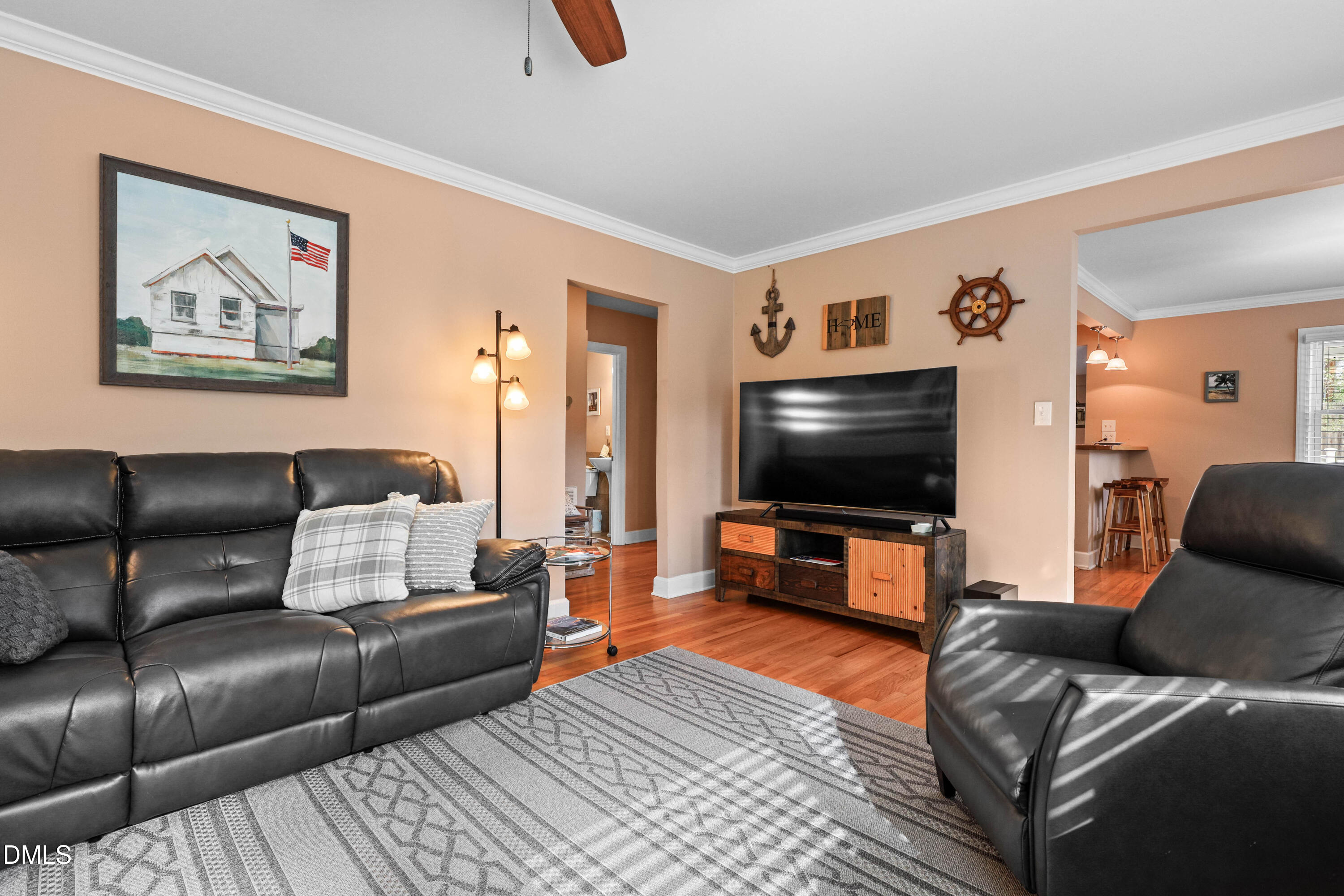 1491 Farrington Point Road Chapel Hill, NC 27517 - Photo 23 of 52 a living room with furniture and a flat screen tv