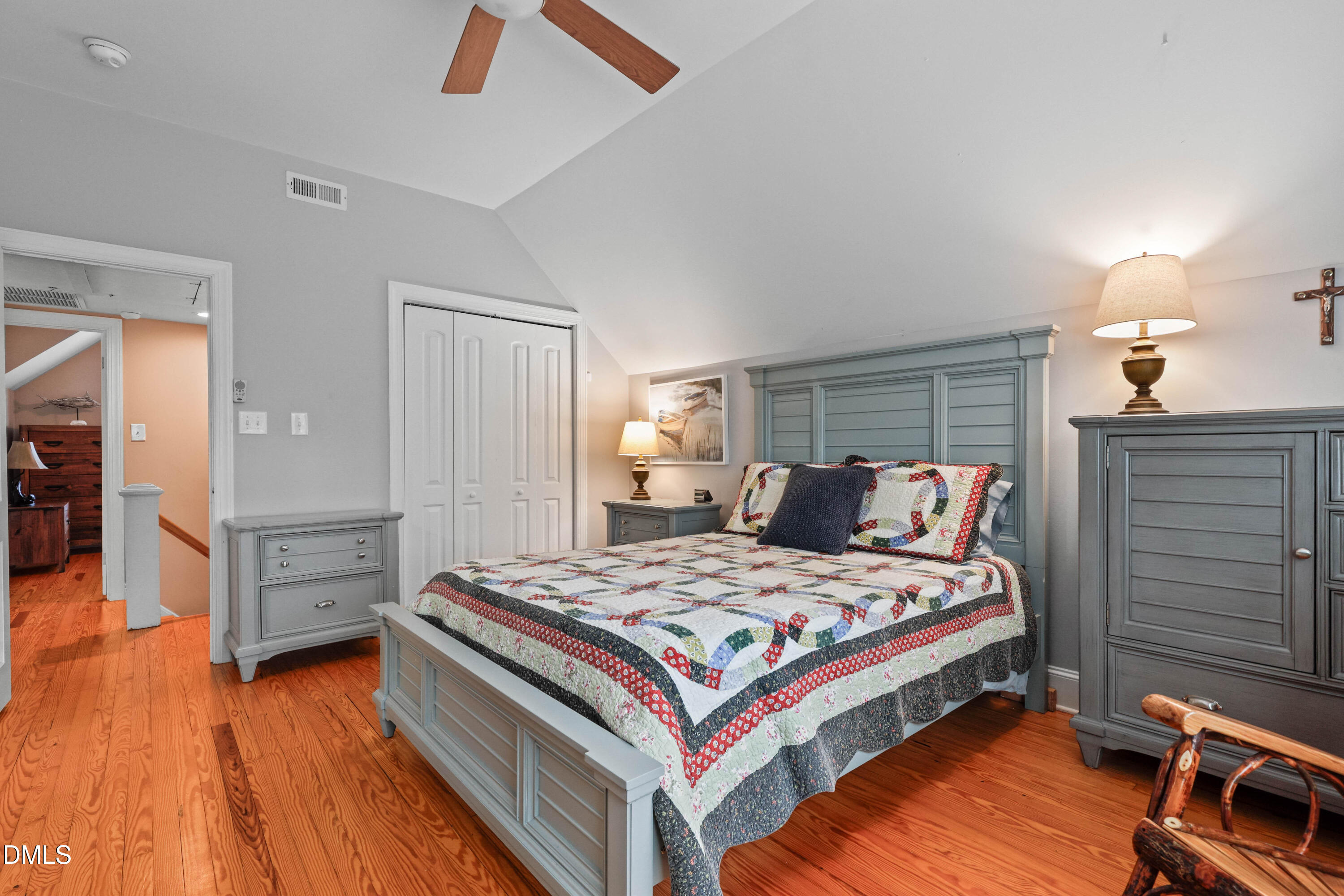 1491 Farrington Point Road Chapel Hill, NC 27517 - Photo 27 of 52 a bedroom with a bed and a machine