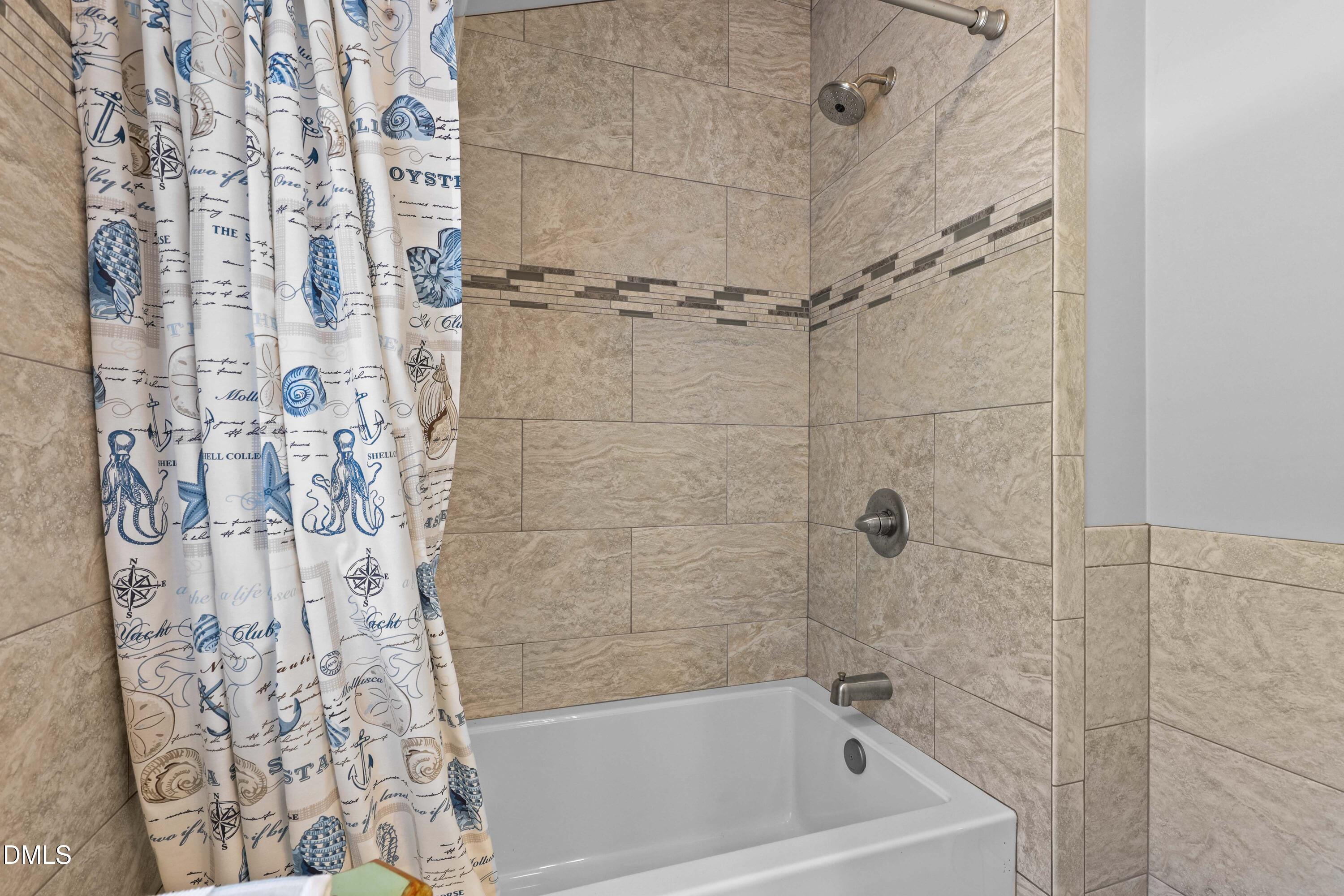 1491 Farrington Point Road Chapel Hill, NC 27517 - Photo 31 of 52 a bath tub sitting next to a shower