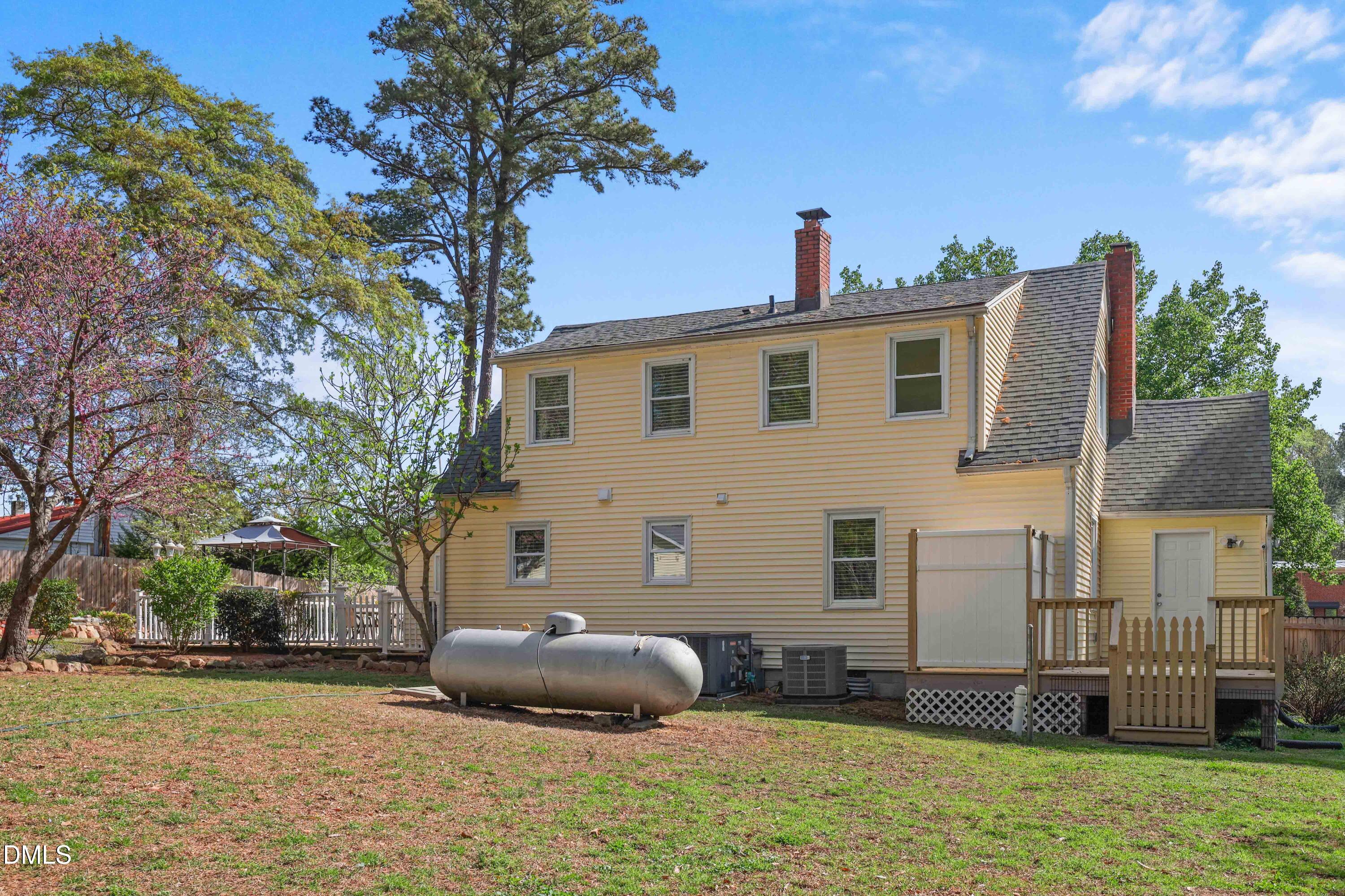 1491 Farrington Point Road Chapel Hill, NC 27517 - Photo 39 of 52 a front view of a house with a yard