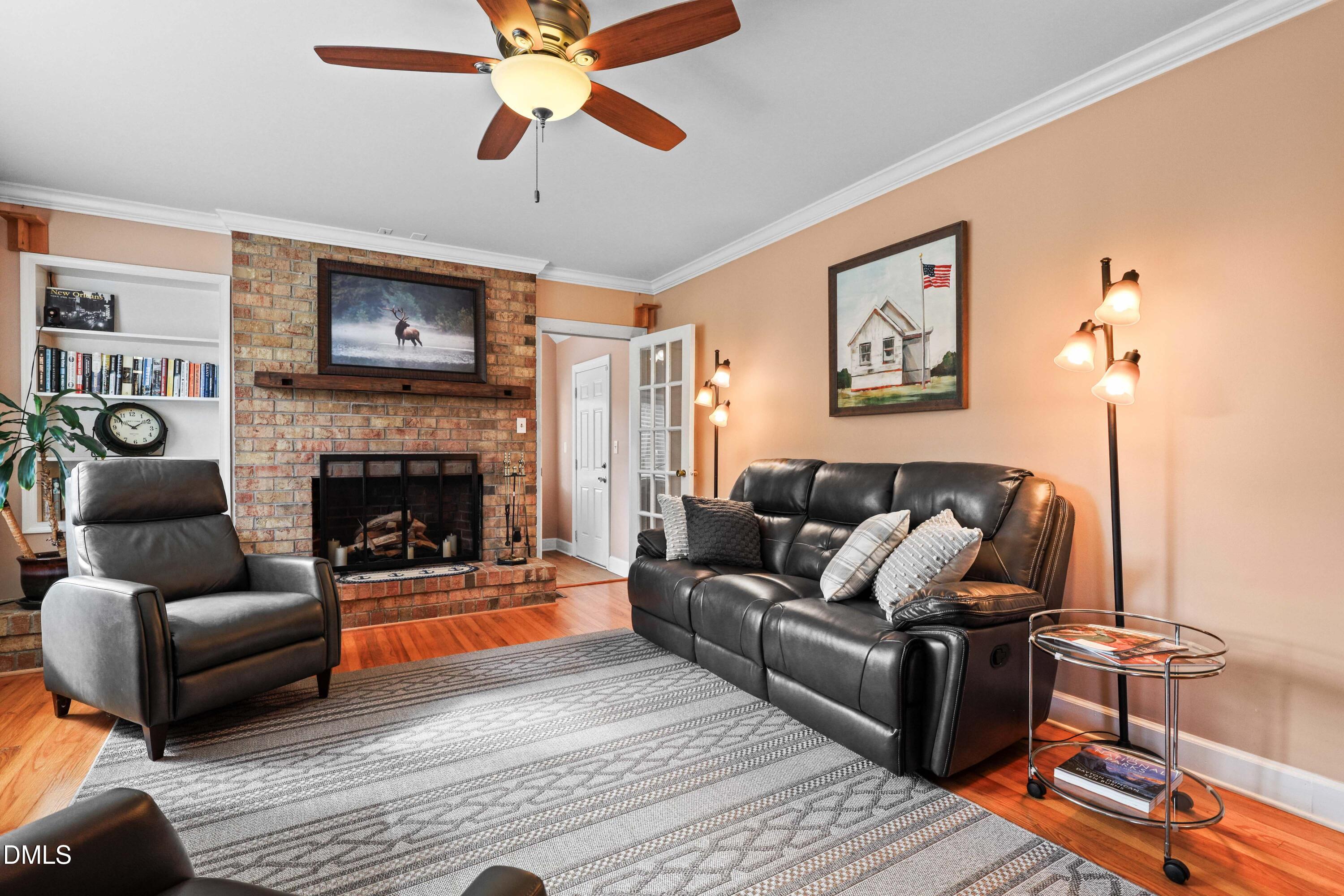 1491 Farrington Point Road Chapel Hill, NC 27517 - Photo 4 of 52 a living room with furniture and a fireplace