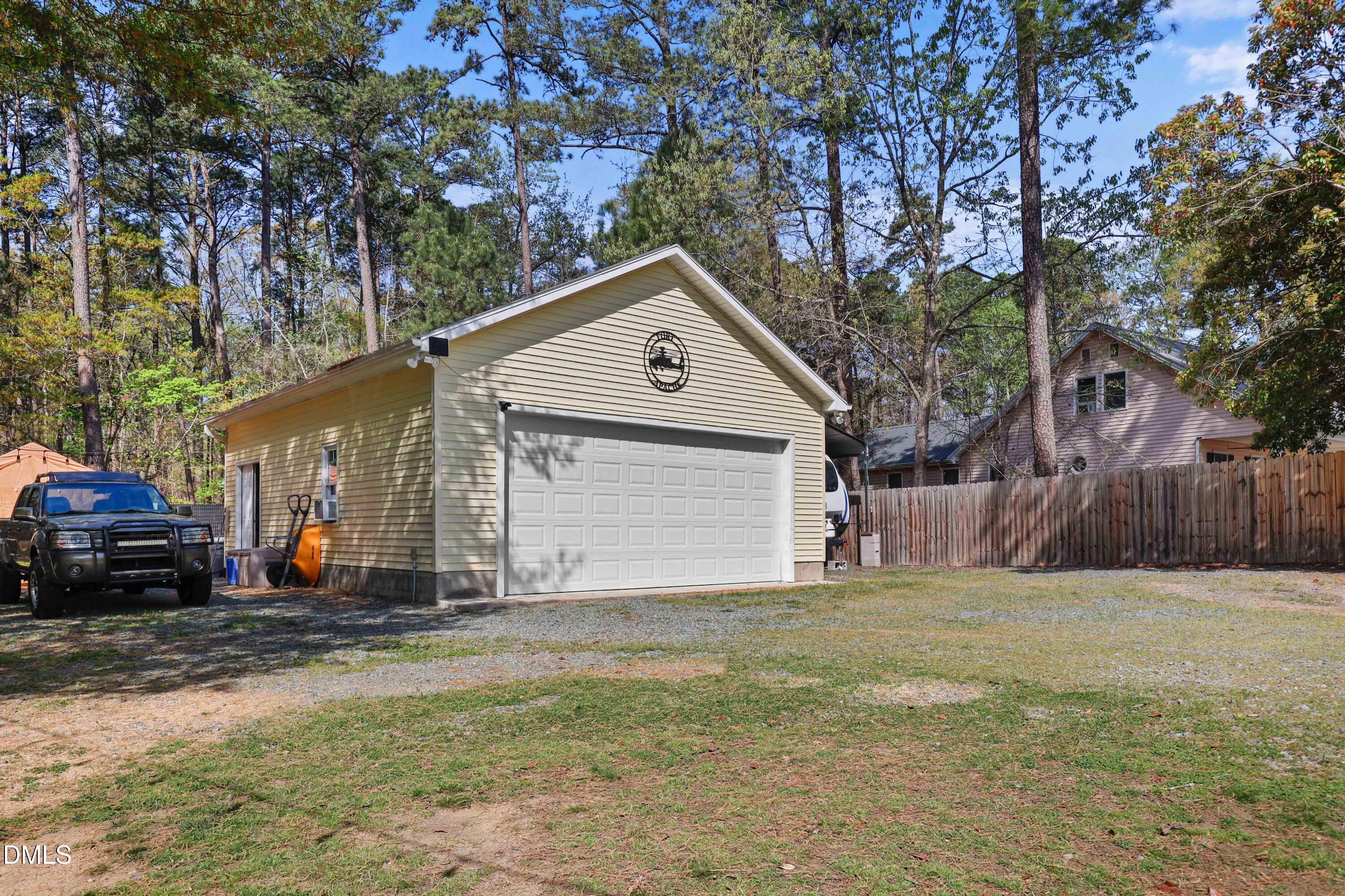 1491 Farrington Point Road Chapel Hill, NC 27517 - Photo 42 of 52 a front view of a house with a yard