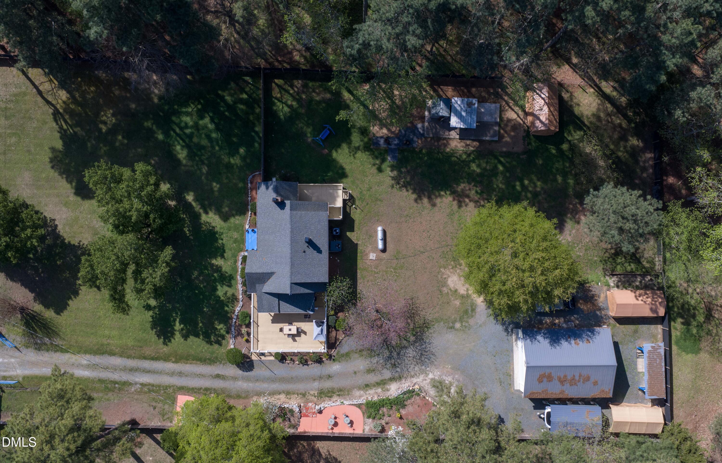 1491 Farrington Point Road Chapel Hill, NC 27517 - Photo 48 of 52 an aerial view of a house with a yard