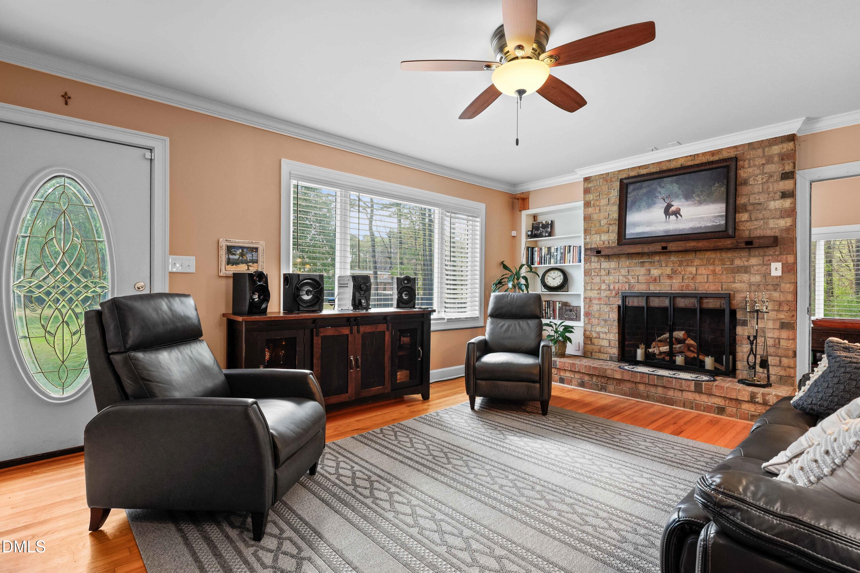 1491 Farrington Point Road Chapel Hill, NC 27517 - Photo 5 of 52 a living room with furniture and a fireplace