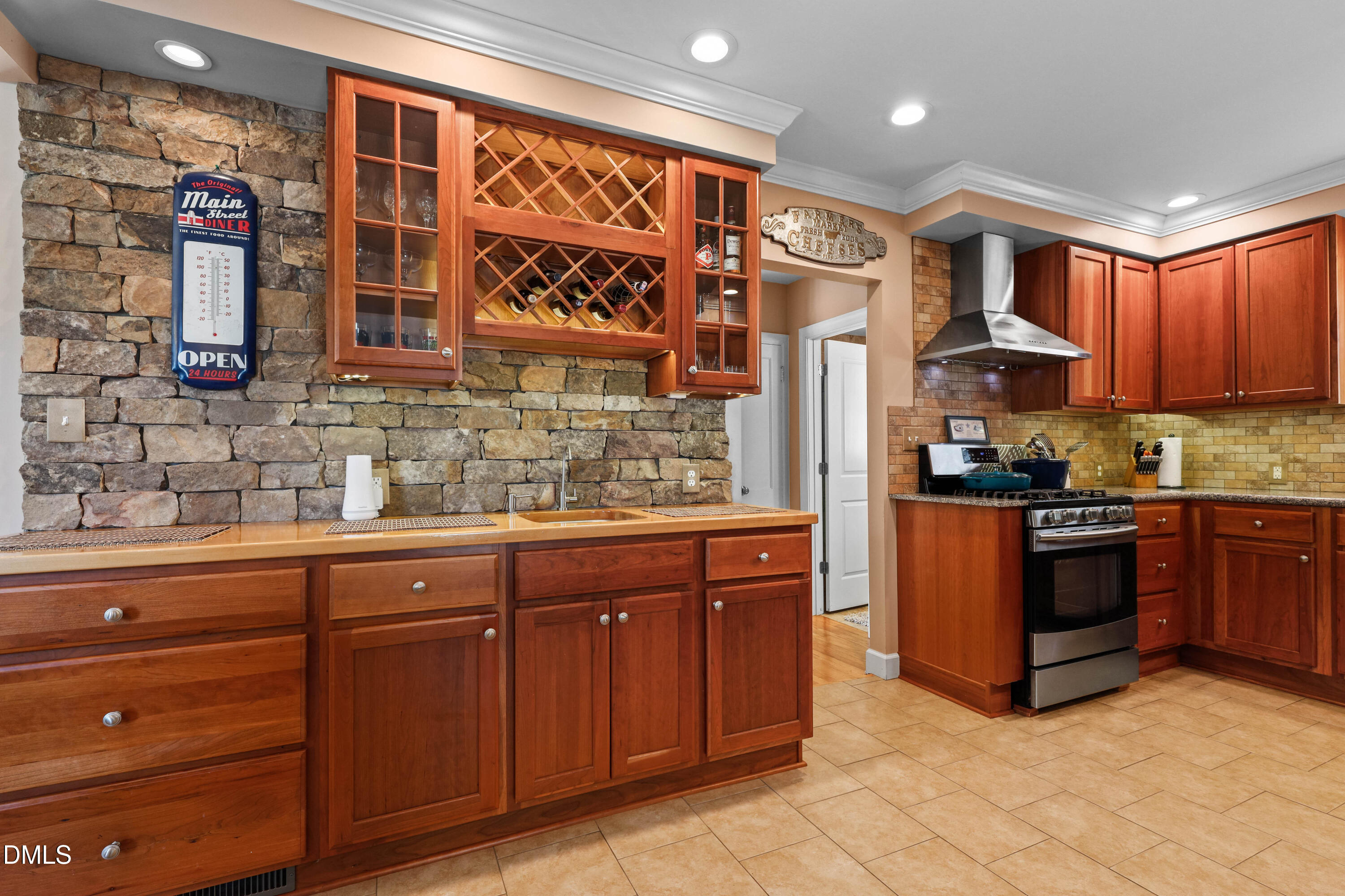 1491 Farrington Point Road Chapel Hill, NC 27517 - Photo 6 of 52 a kitchen with stainless steel appliances granite countertop a refrigerator and a sink