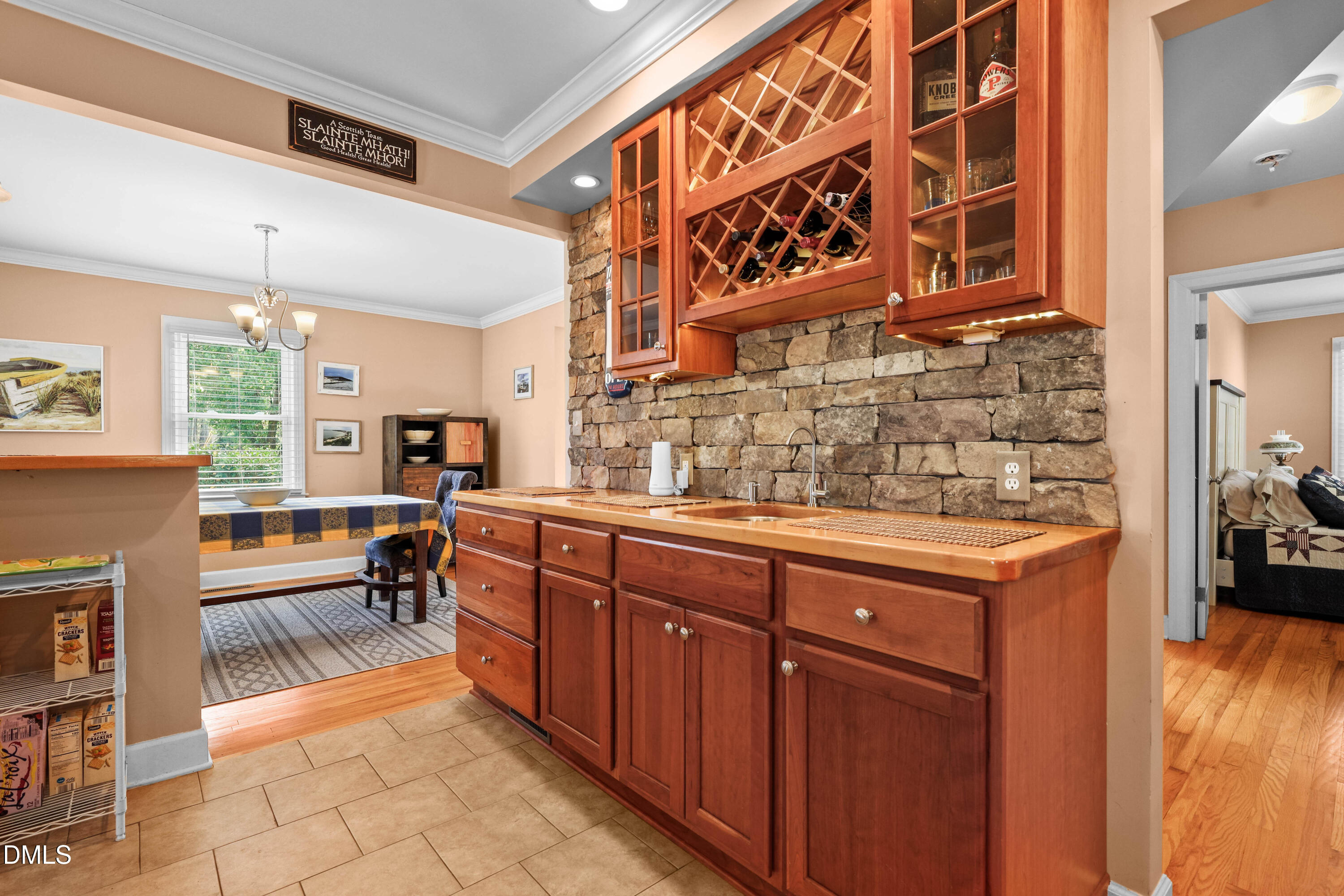 1491 Farrington Point Road Chapel Hill, NC 27517 - Photo 7 of 52 a kitchen with stainless steel appliances granite countertop a sink and cabinets