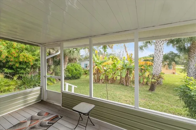 a view of a room with window and pool table