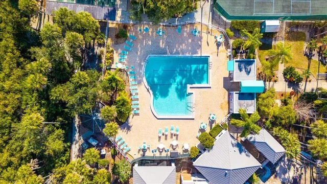 a view of swimming pool with outdoor seating