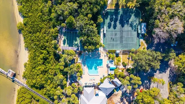 an aerial view of a house with a lake view