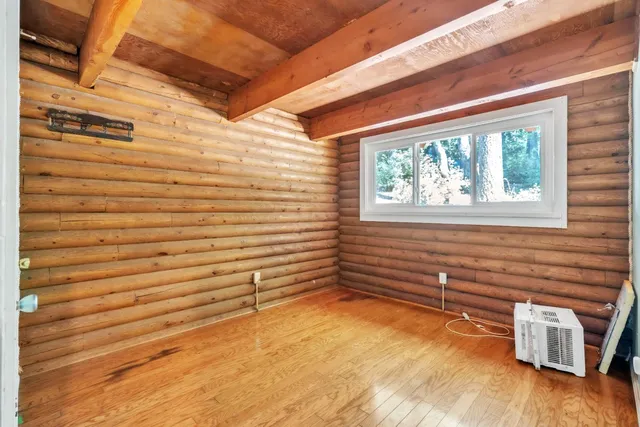 a view of a backyard with wooden floor