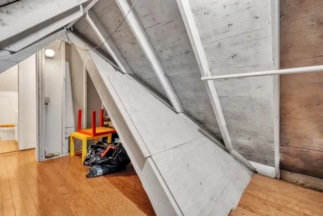 a view of a room with a large window