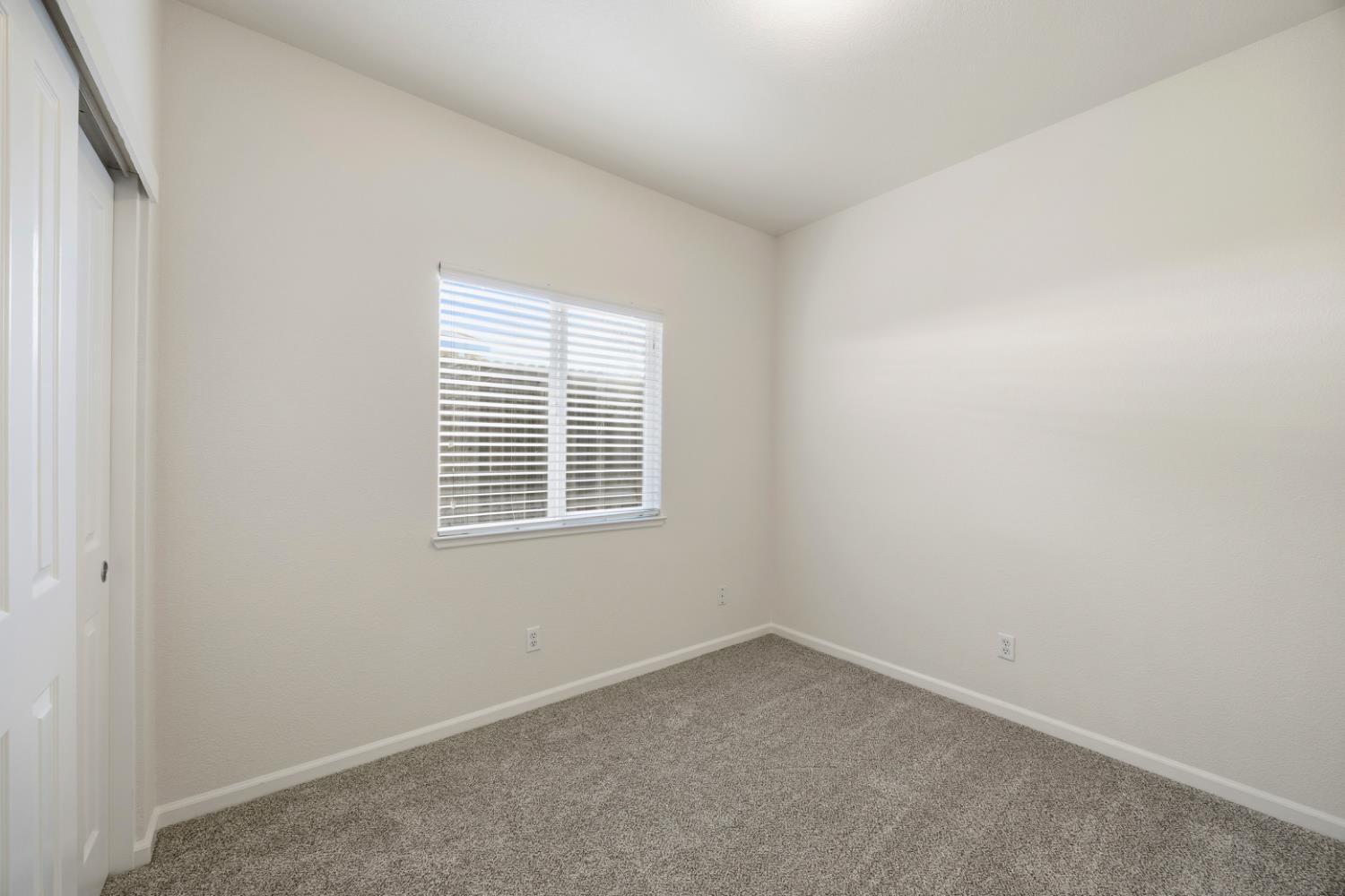 170 Par Court Ione, CA 95640 - Photo 15 of 31 an empty room with a window