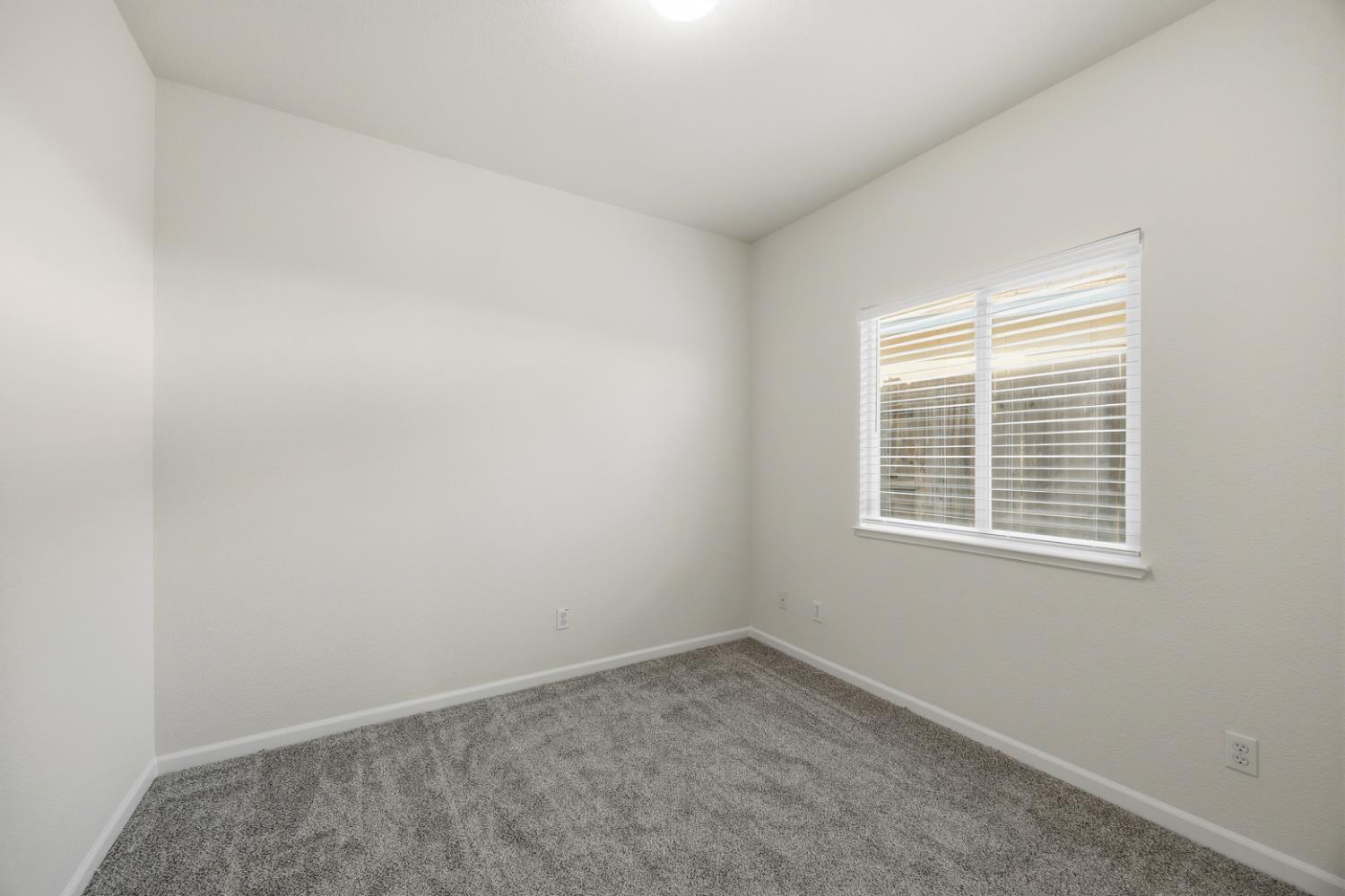 170 Par Court Ione, CA 95640 - Photo 16 of 31 an empty room with a window