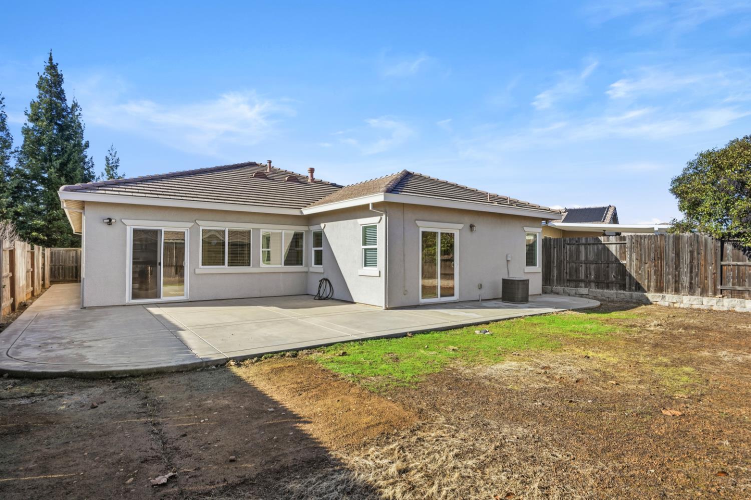 170 Par Court Ione, CA 95640 - Photo 25 of 31 a front view of a house with a garden and yard