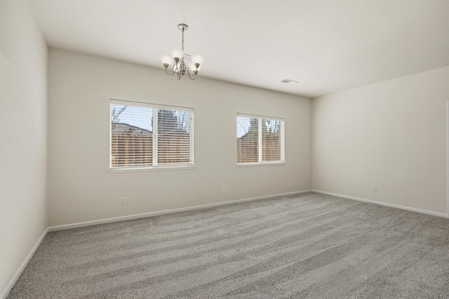 170 Par Court Ione, CA 95640 - Photo 6 of 31 a view of an empty room with a window
