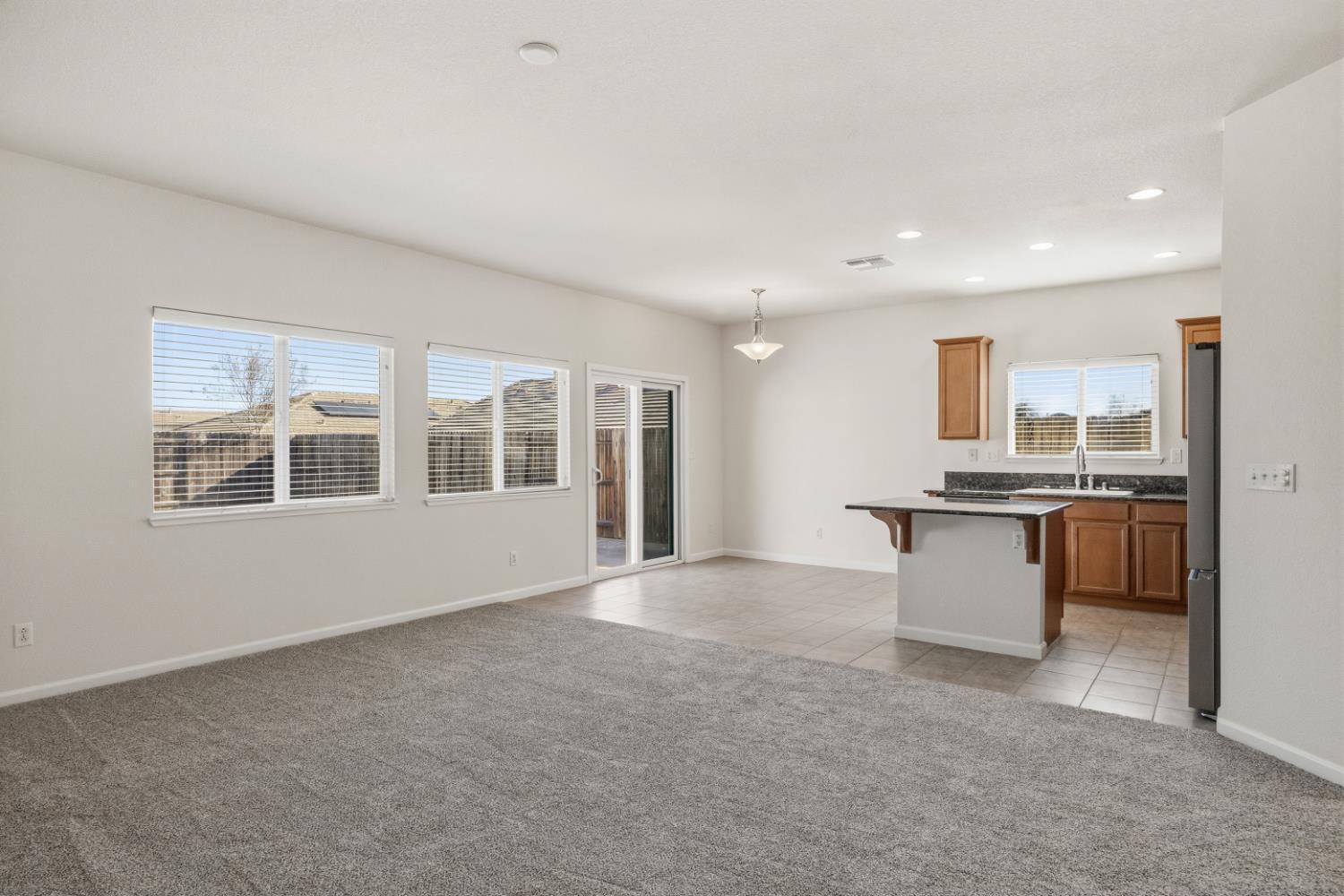 170 Par Court Ione, CA 95640 - Photo 10 of 31 a view of an empty room with kitchen