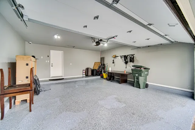 a big room with furniture and a flat screen tv