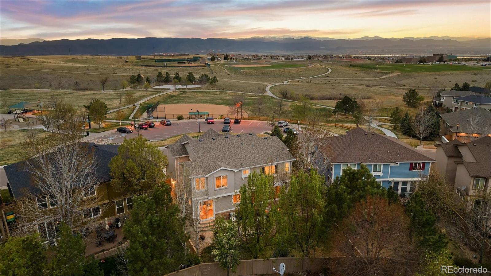 2677 Pemberly Avenue Highlands Ranch, CO 80126 - Photo 2 of 50 a view of lake with mountain